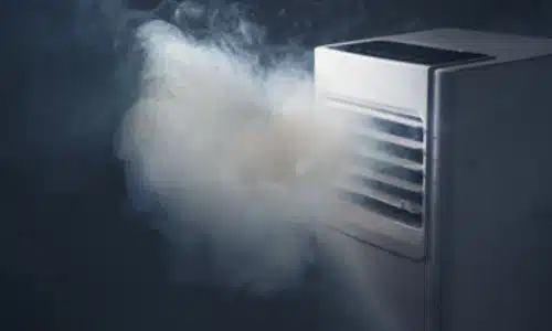 Impianto di aspirazione del fumo localizzato. Sfondo nero con del fumo grigio che viene aspirato dalle ventole dell'impianto